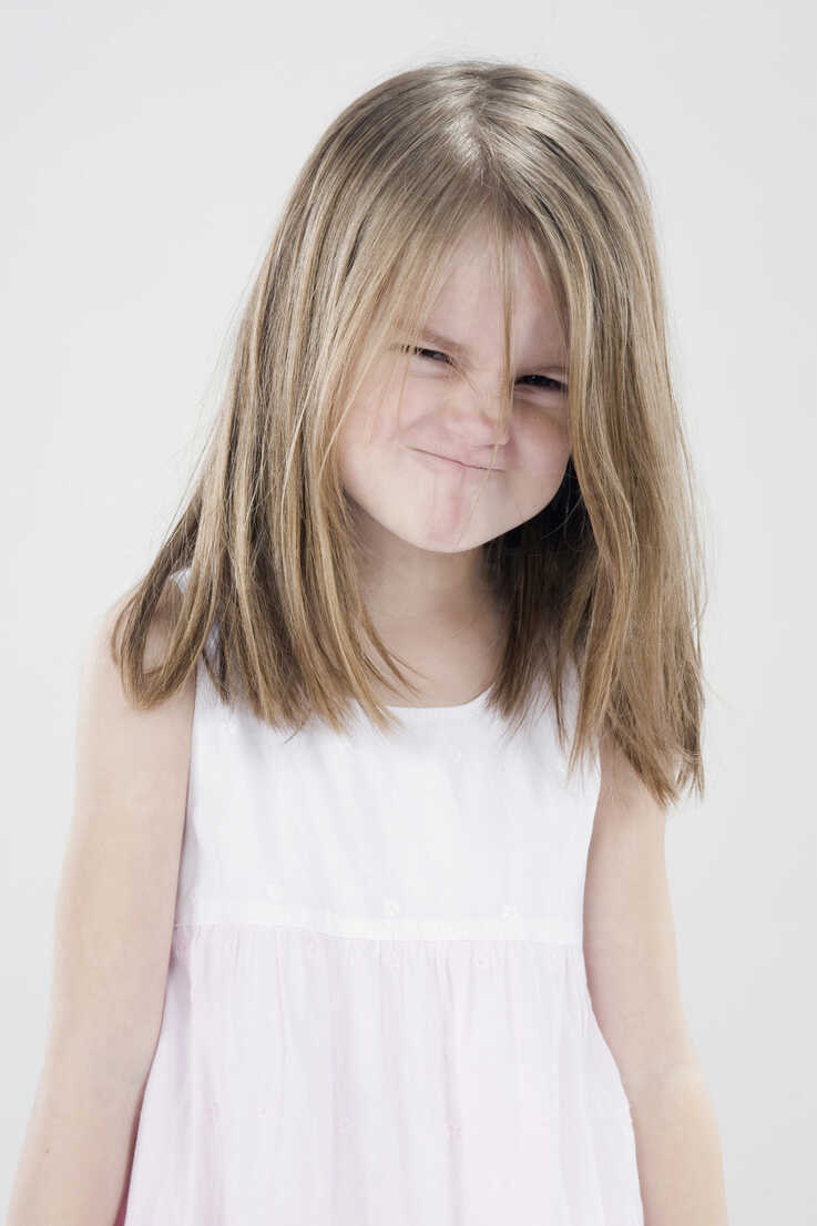 Girl 4 5 Pulling Funny Faces Stockphoto