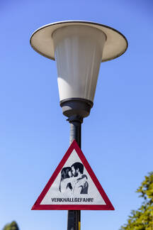 Austria Salzburg View Of Love Warning Sign On Street Light Stockphoto