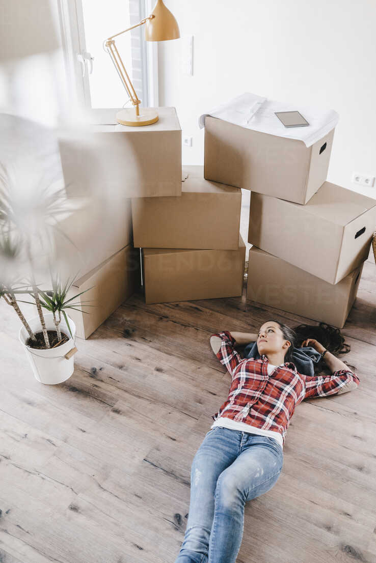 Mature Woman Moving House Lying On Floor Thinking Josf005 Joseffson Westend61