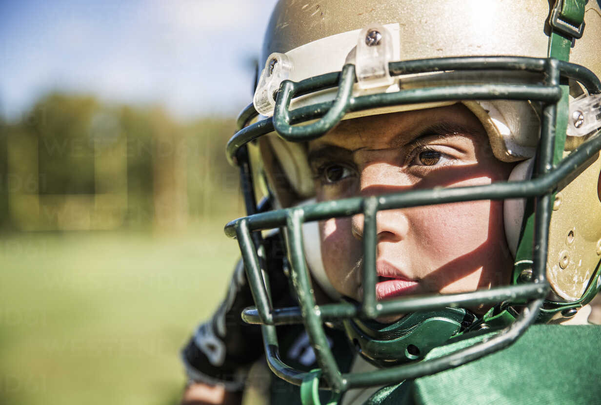 Close Up Of American Football Player Looking Away Stockphoto