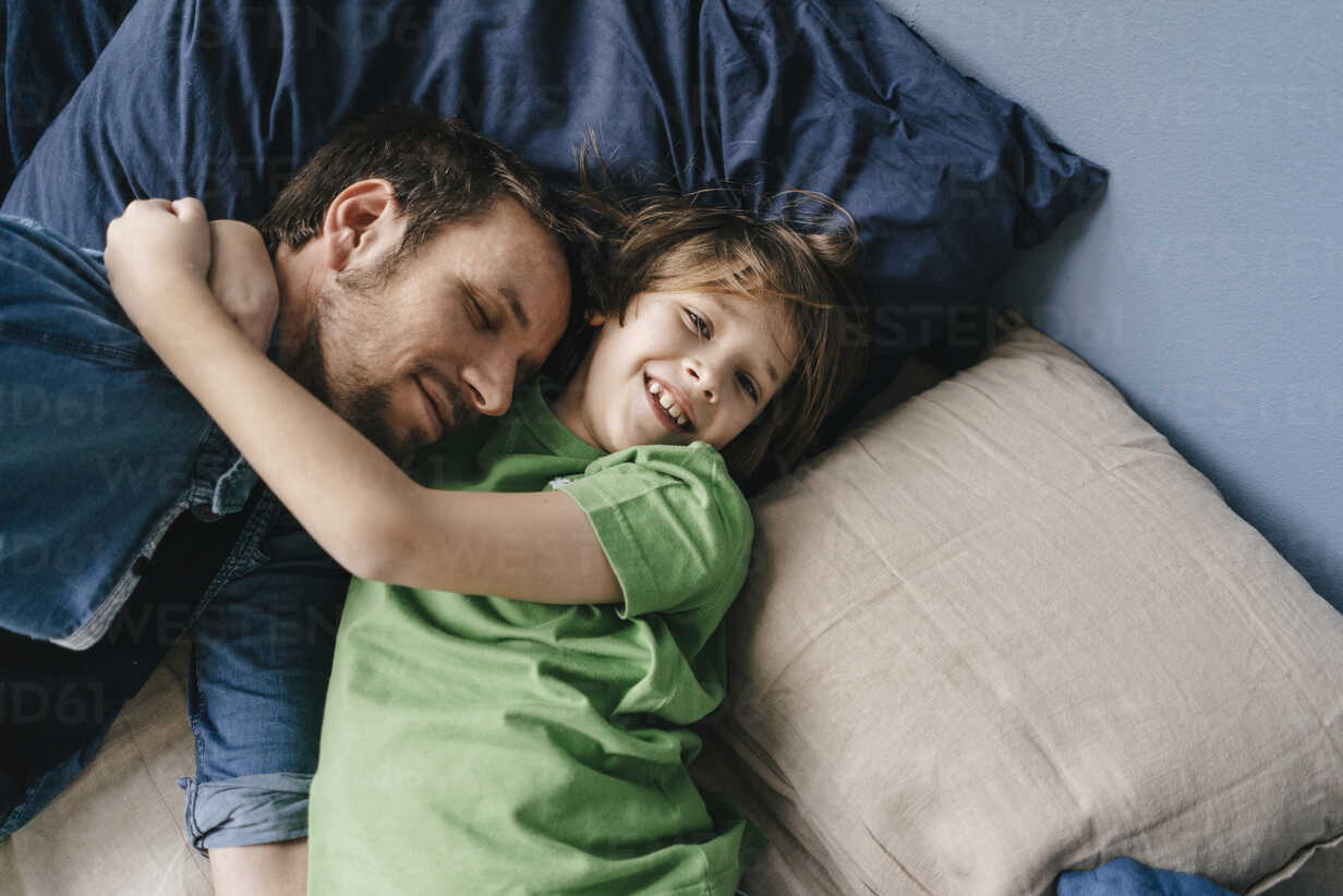 Father And Son Father And Son Cuddling At Home Stockphoto For Instance You Can Volunteer To 3101