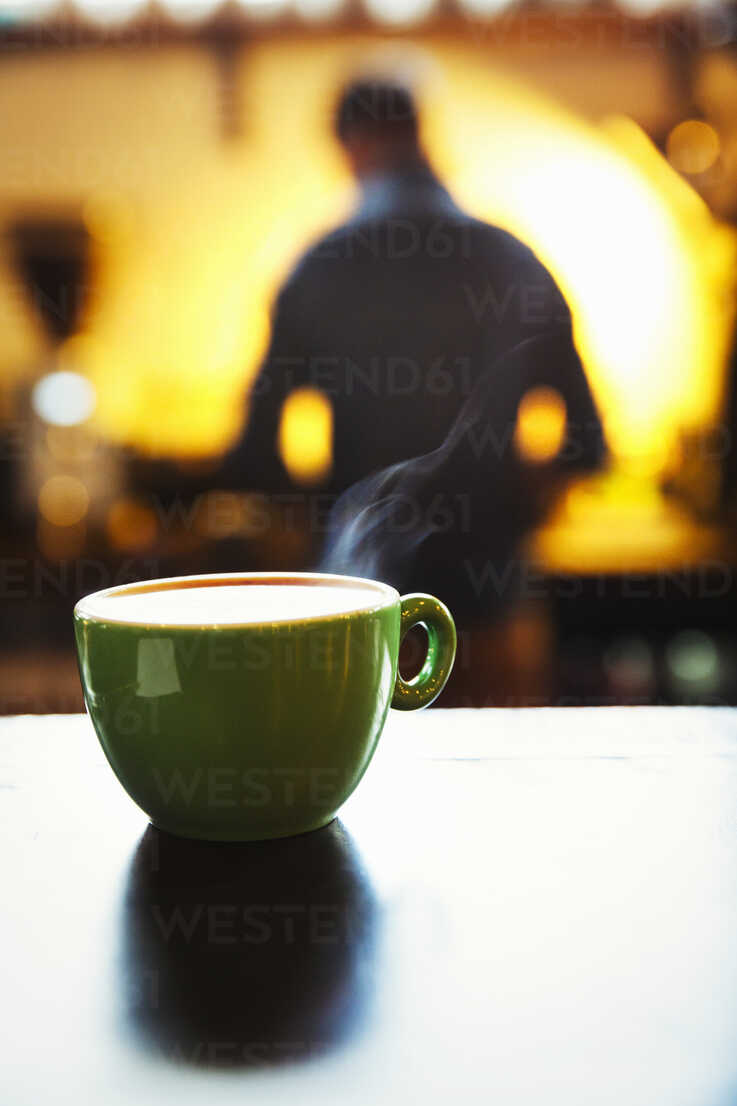 Specialist Coffee Shop A Cup Of Coffee On A Counter With A Frothy Top Stockphoto