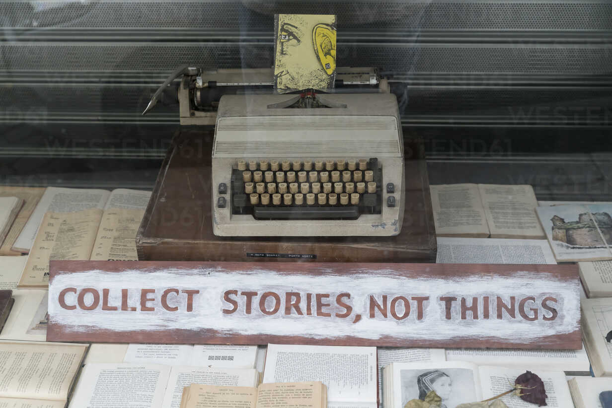 Portugal Porto View Into Window Display With An Old Typewriter And The Request Collect Stories Not