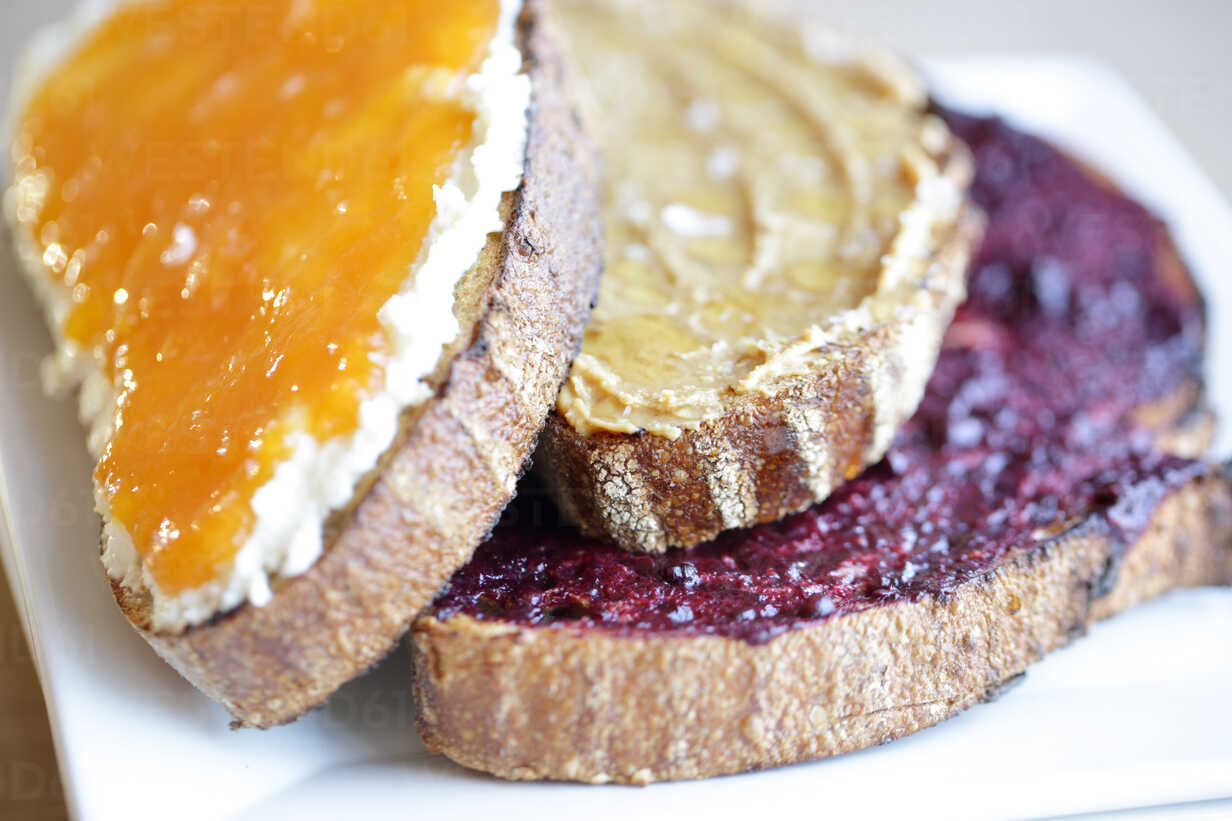 Sliced Bread With Jam Cheese And Nut Butter Stockphoto