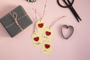 Valentine Gift Paperweight Self Made Tags And Scissors On Pink Background Momf00606 Mosuno Media Westend61