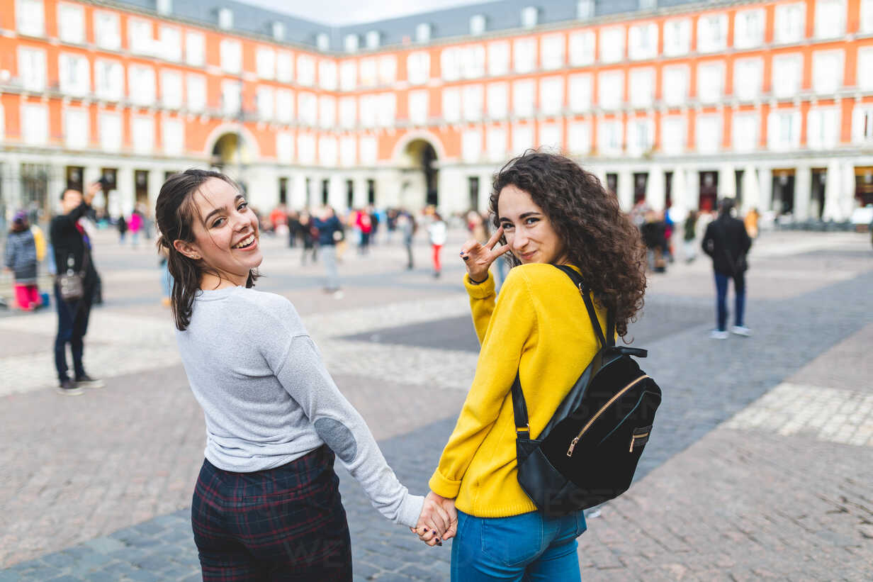 Girlfriends Exploring City Madrid Spain Stockphoto