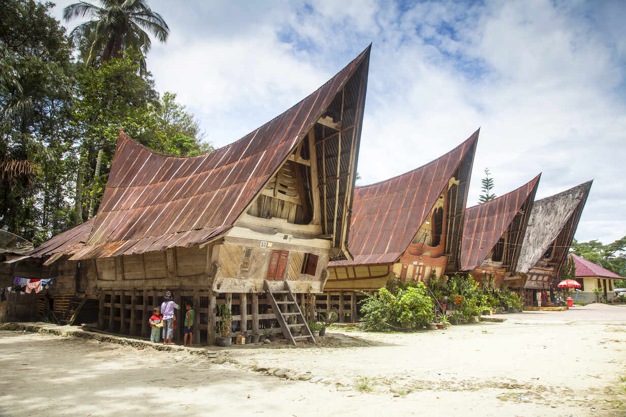 Traditional Batak Wooden Houses Tomok Lake Toba Samosir Island   Traditional Batak Wooden Houses Tomok Lake Toba Samosir Island Sumatra Indonesia Southeast Asia Asia RHPLF11783 