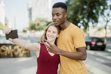 Boy And Girl In Love Taking A Selfie Stockphoto