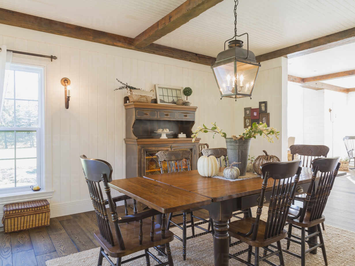 Interior view of dining room with brown stained pine wood antique