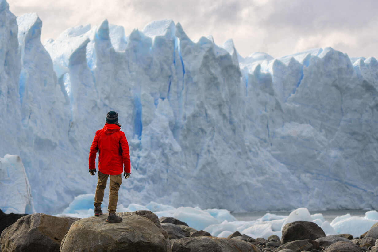 Man In Front Of Perito Moreno Glacier El Calafate Los Glaciares National Park Patagonia Argentina Lomf