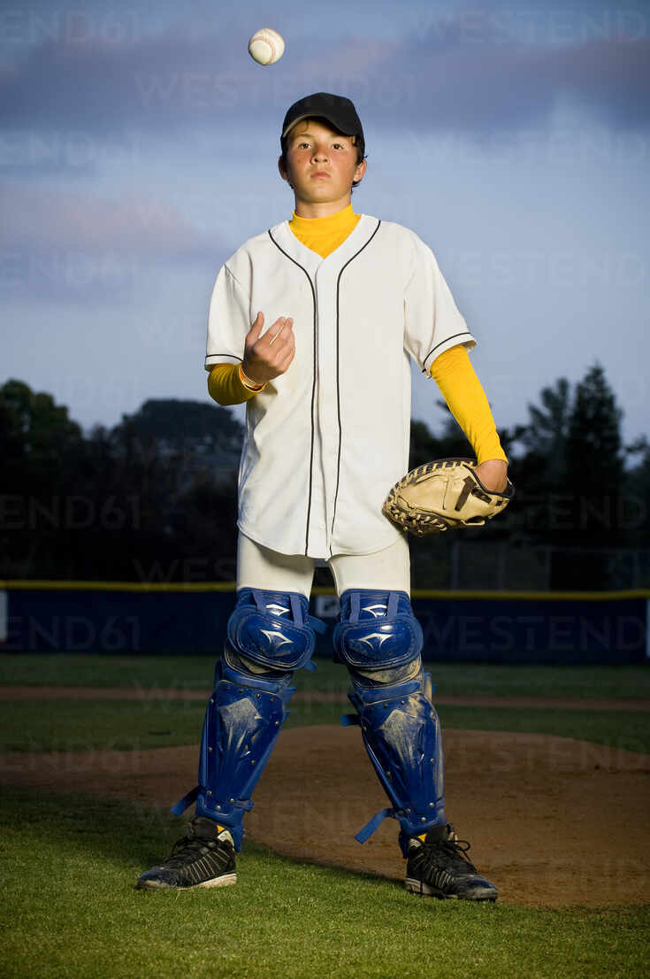 boy in baseball uniform