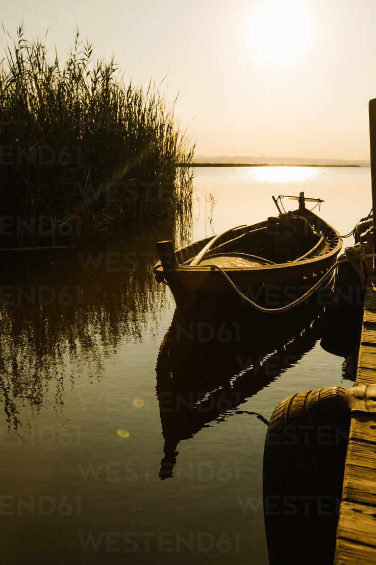 Moored Boat By Wooden Pier Adsf Addictive Stock Creatives Westend61