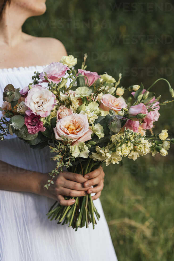 Woman Holding Bouquet Of Fresh Flowers Stockphoto