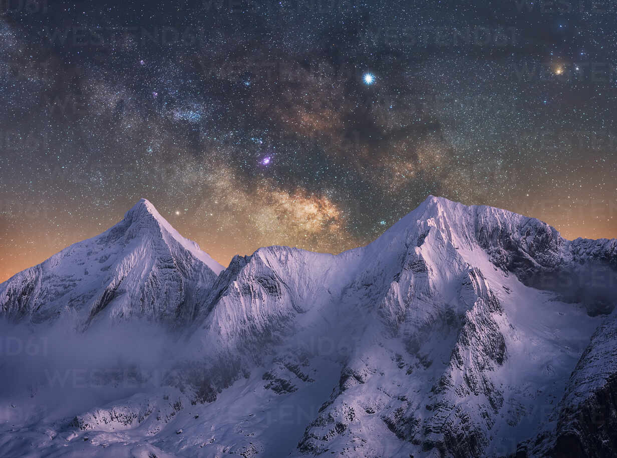 Amazing view of white snowy mountain range under incredible night ...