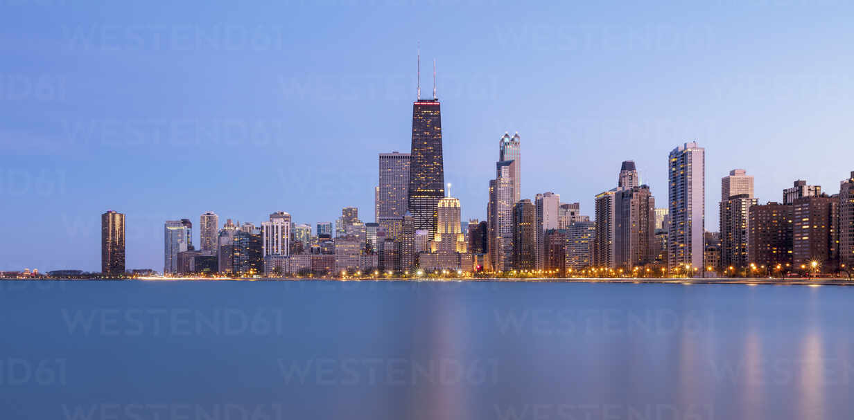 Illuminated View Of Chicago Skyline At Dusk Usa Stockphoto